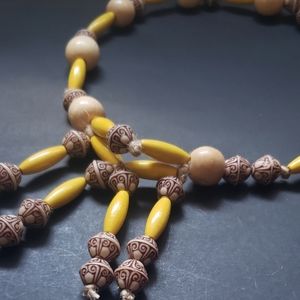 Handcrafted yellow and resin bead hemp necklace